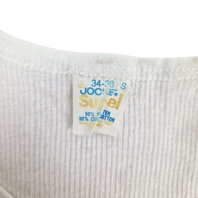 Lot 246 - Freddie Mercury Owned White Vest (UK)